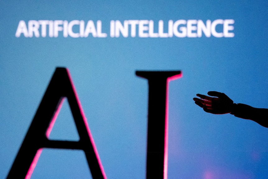 Silhueta de uma mão diante das palavras Artificial Intelligence e das letras AI.